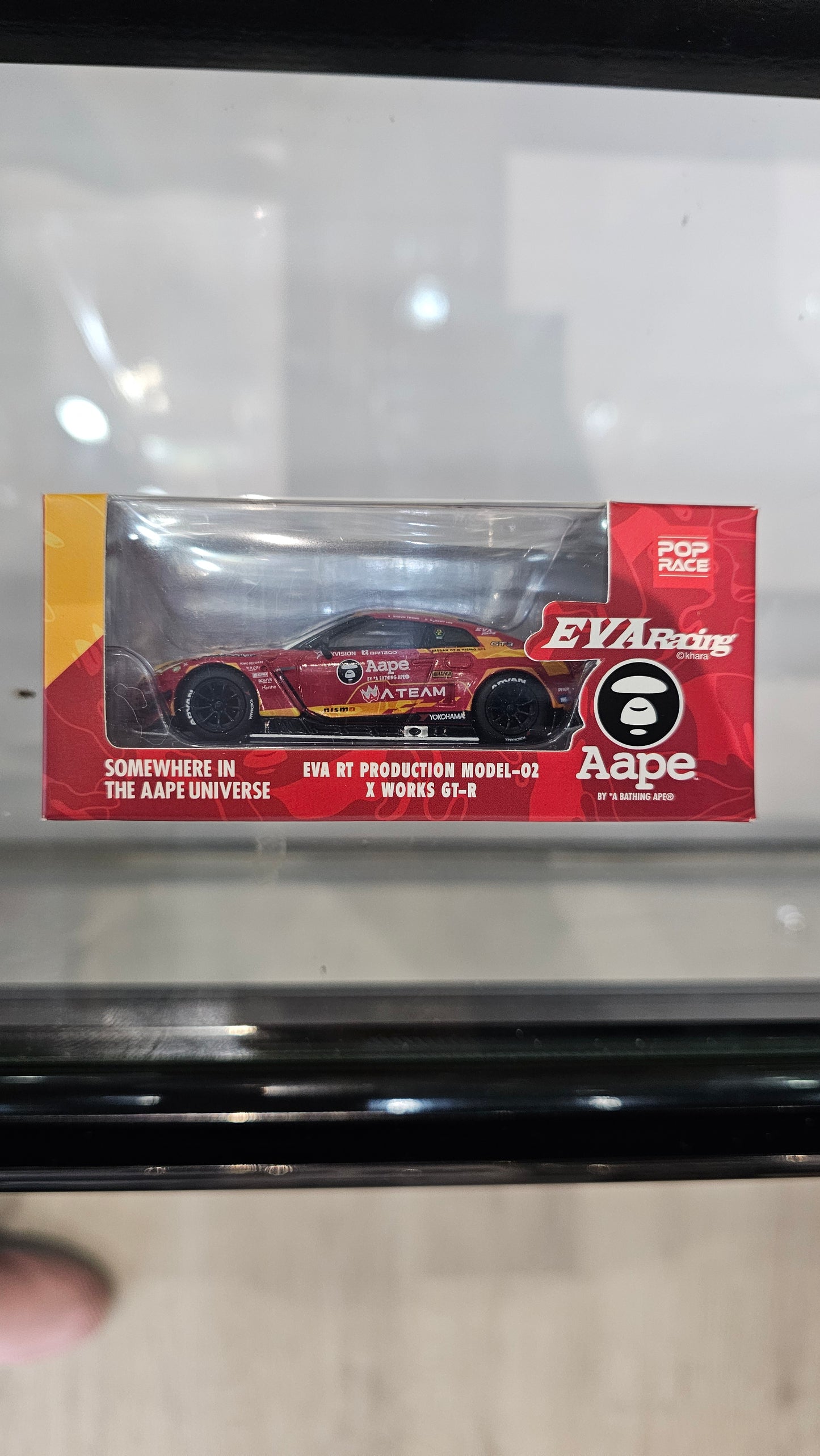 #128 Red Nissan evaRT Racing Pop Race Box HongKong Exclusive - Pop Race 1:64
