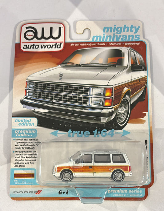 White with Woodgrain 1985 Dodge Caravan